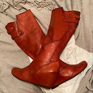 Tall burnt orange leather boot with hidden wedge!